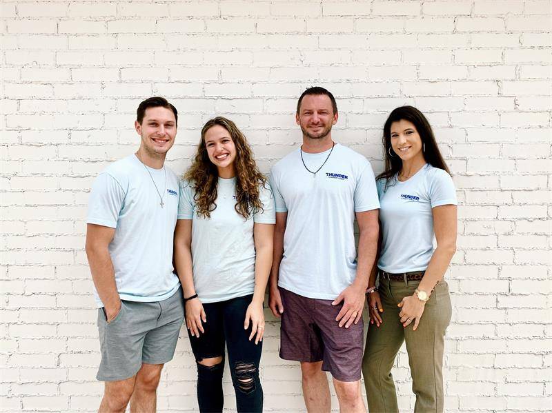 Four members of the ThunderLaser USA team picture