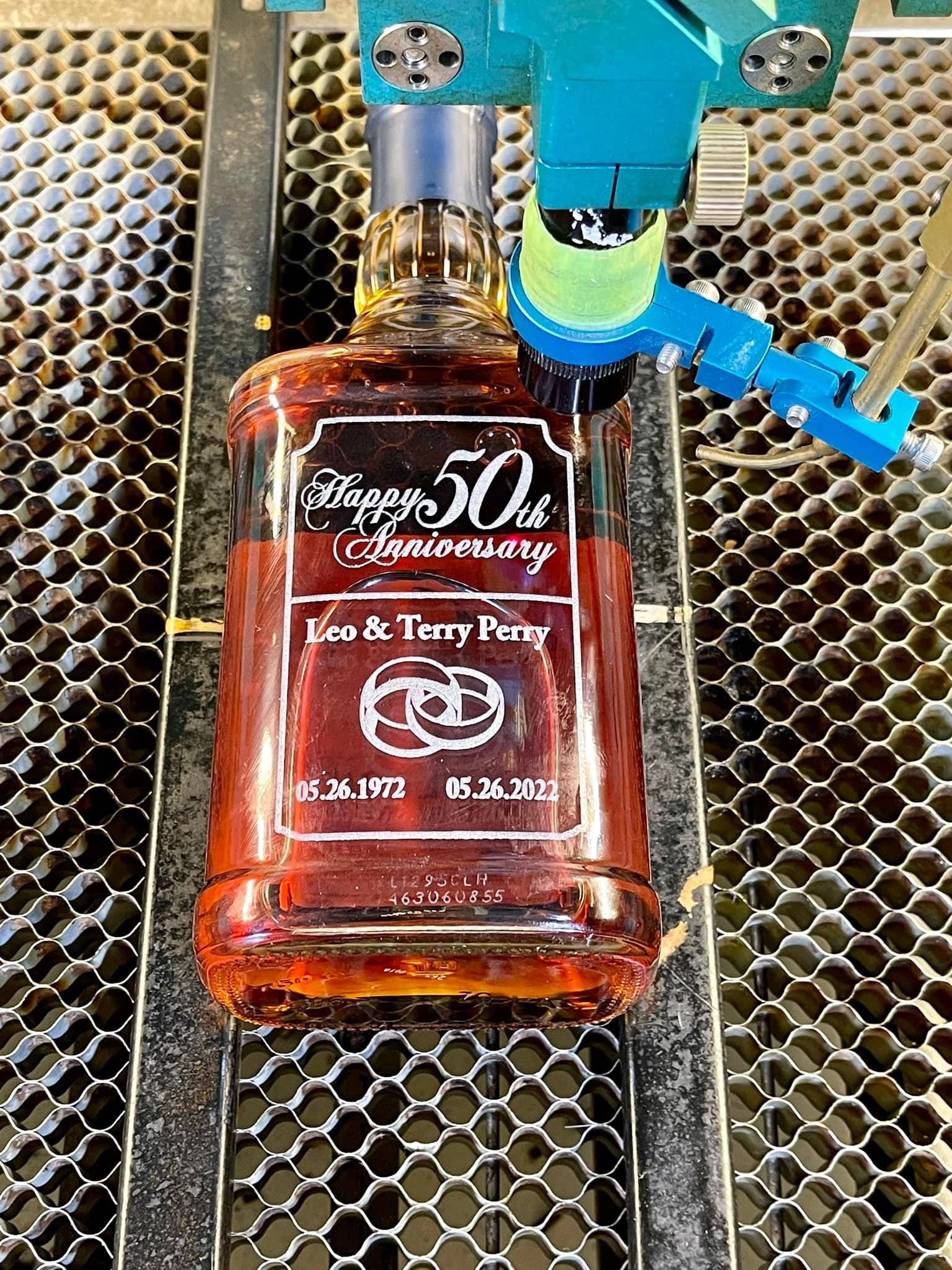 etched glass wine bottle