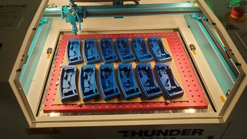 Laser engraving a gun