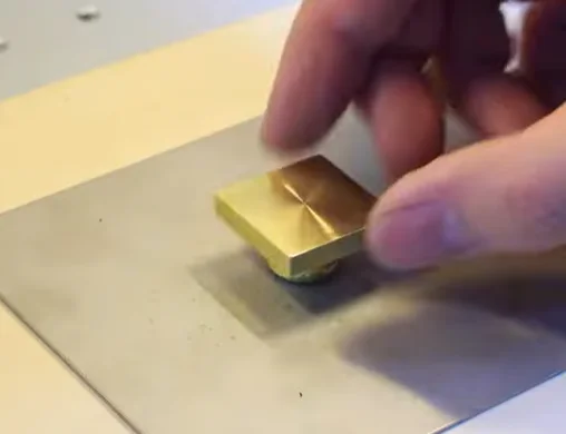 brass seal on the pad