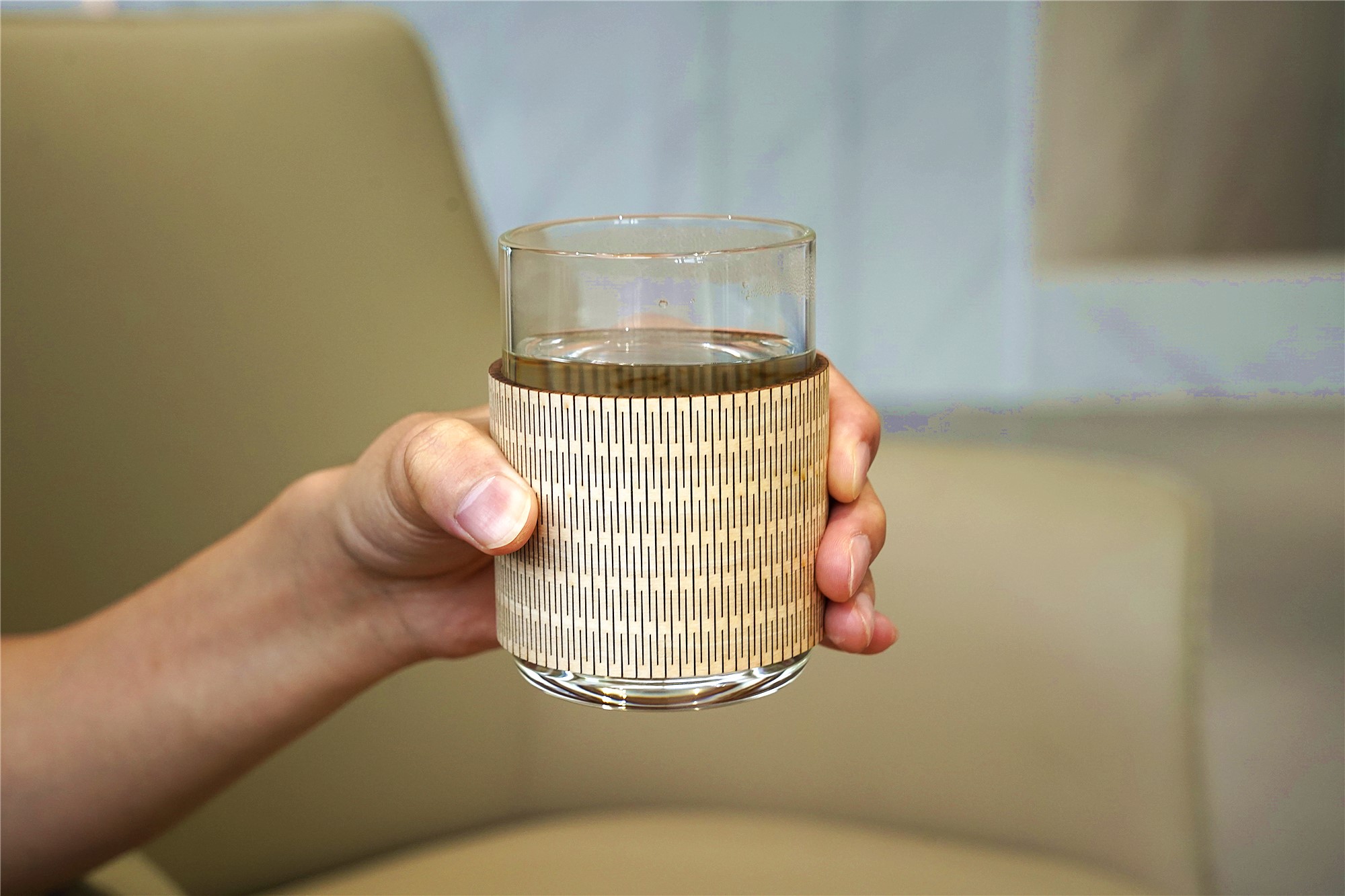 a beautiful laser cut wooden cup sleeve