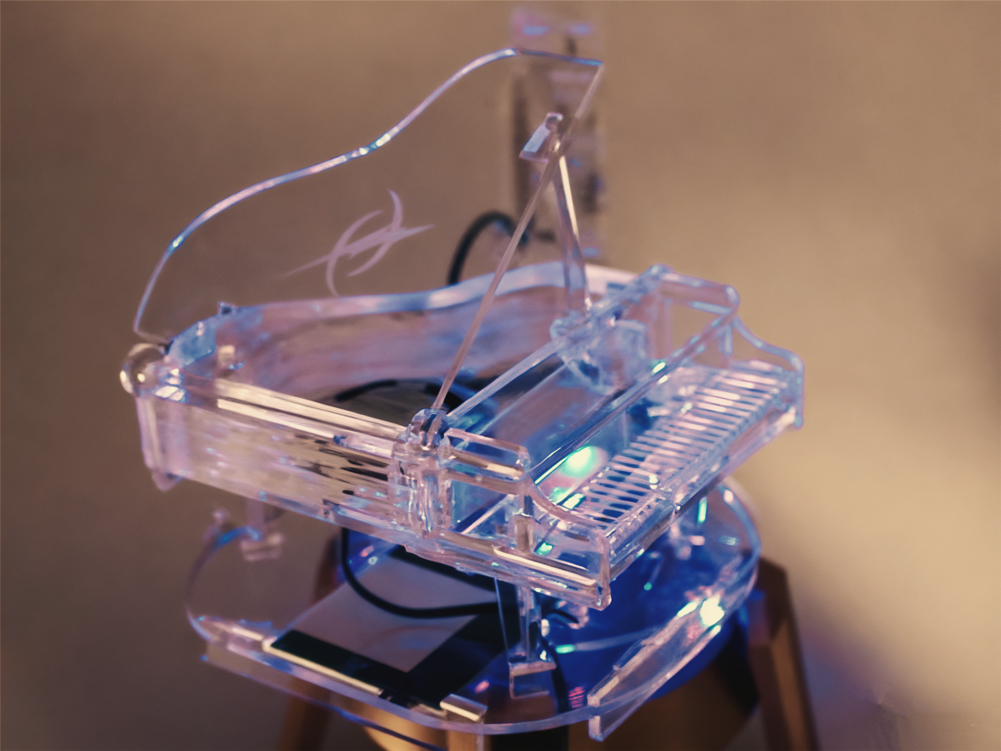 A laser cut acrylic piano model
