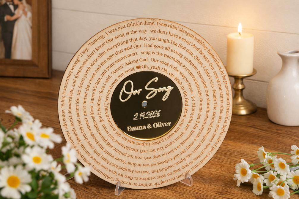 A well laser engraved CD Decor with couples' name