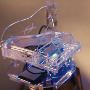 A laser cut acrylic piano model